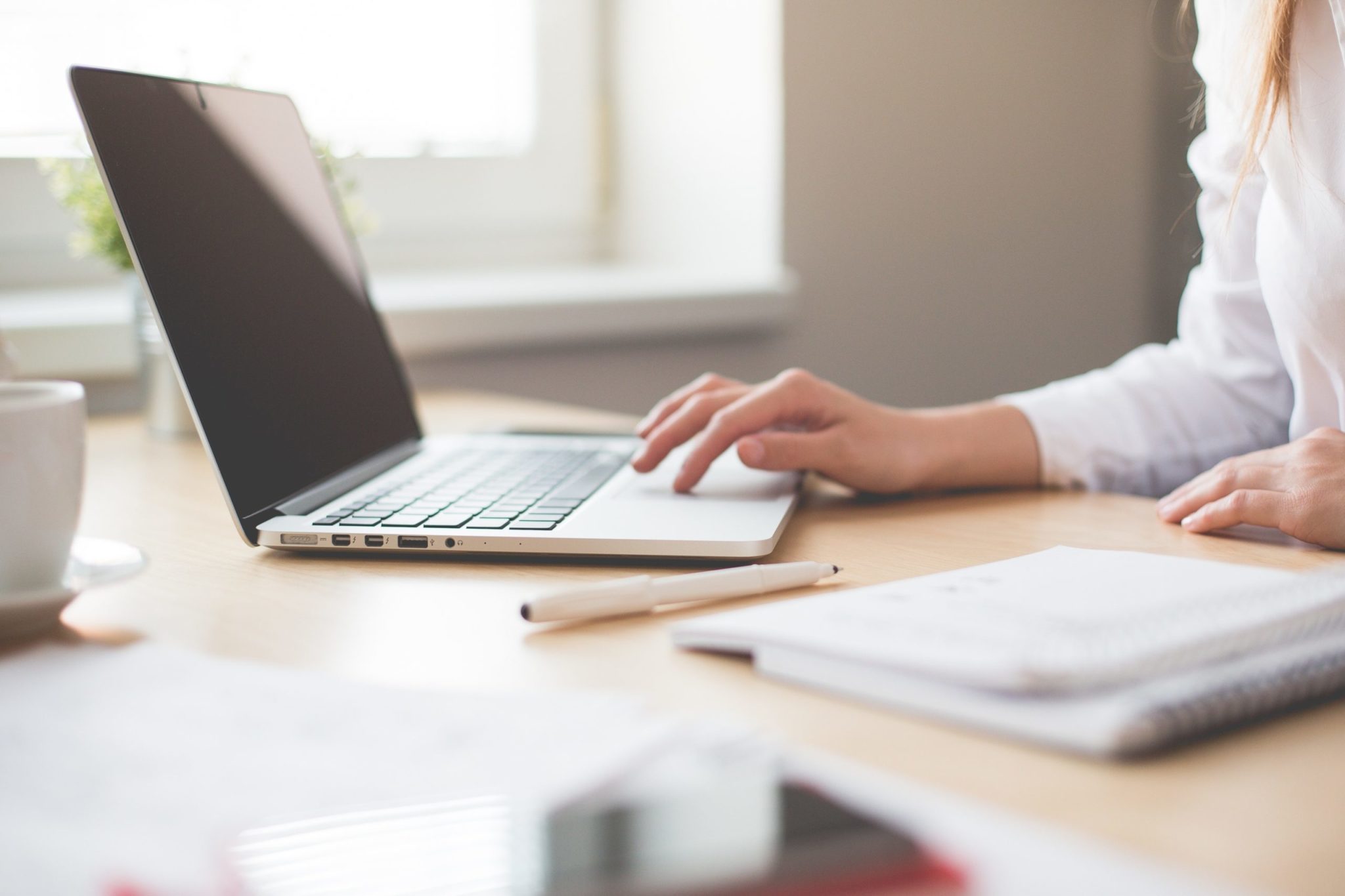 Woman on laptop.